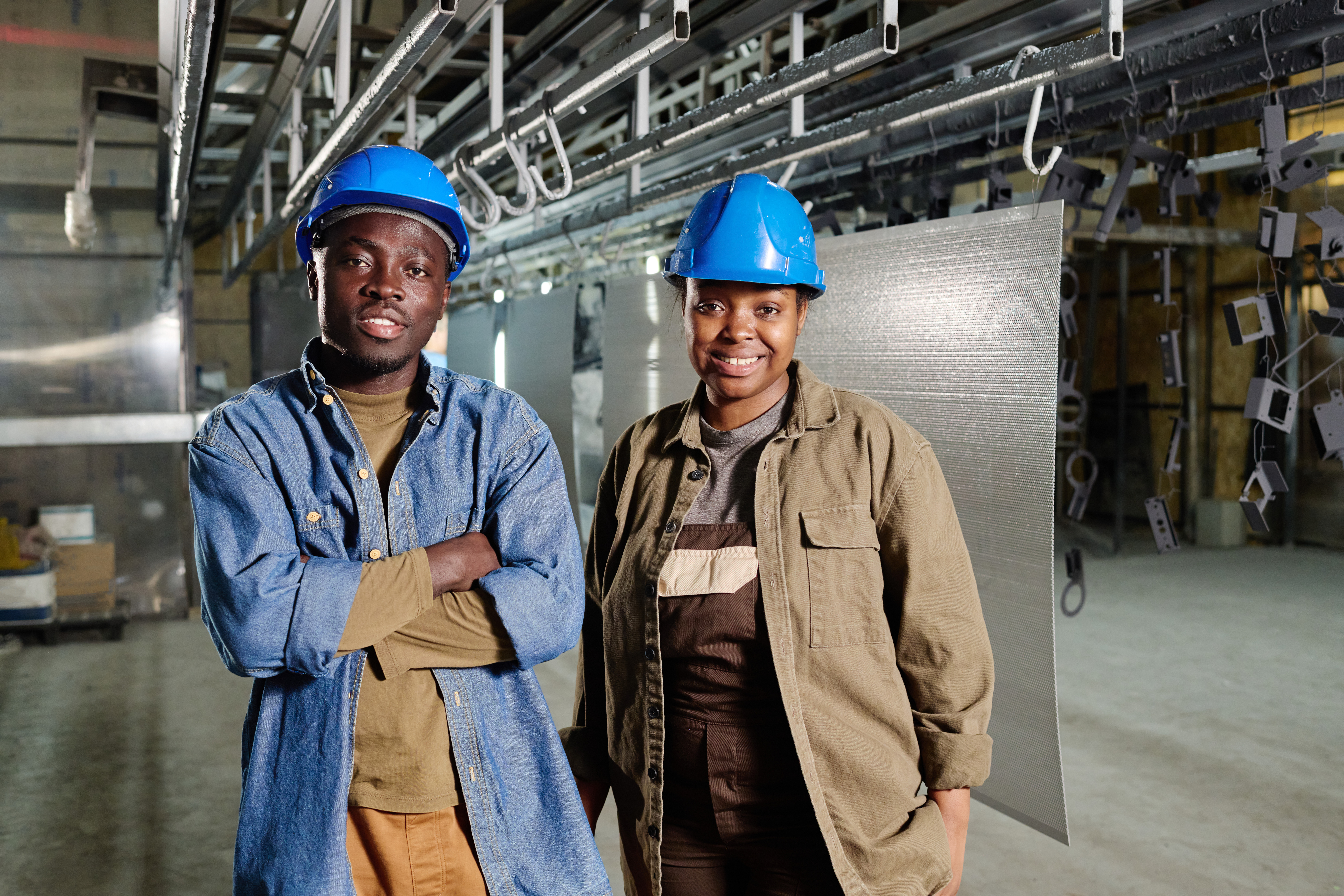 African colleagues working at metal industry